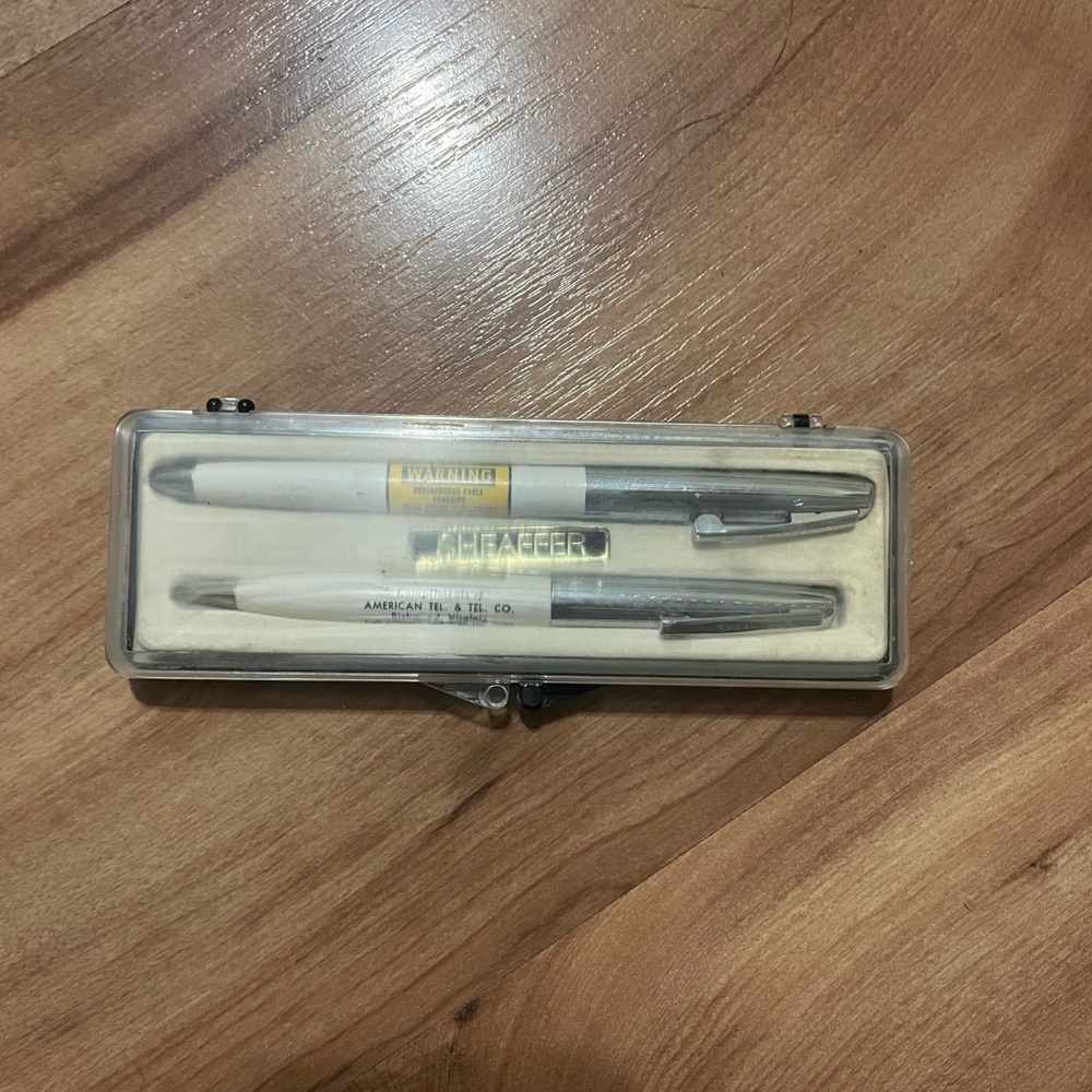 Vintage Sheaffer pen and pencil set with advertising for American Tel. & Tel. Co